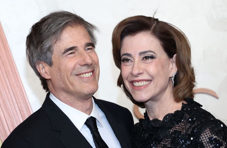 Walter Salles and Fernanda Torres pose on the red carpet during the Oscars arrivals at the 97th Academy Awards in Hollywood, Los Angeles, California, U.S., March 2, 2025. REUTERS/Aude Guerrucci