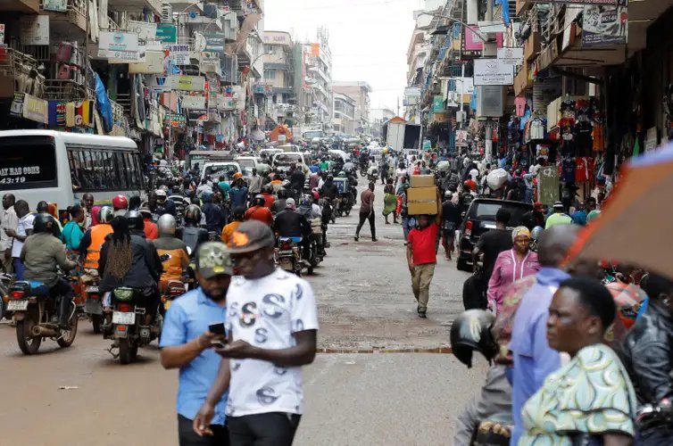 Motorcycle taxis carry passengers following a resurgence of Ebola involving the Bundibugyo strain, a rare variant of the virus with no approved vaccine currently available, along Ben Kiwanuka street in Kampala, Uganda May 21, 2026. REUTERS/Abubaker Lubowa